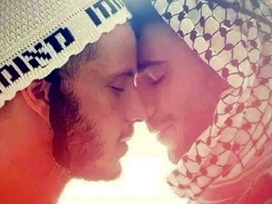 Мадонна отрекламировала новый альбом фотографией целующихся араба и еврея