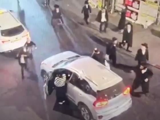 Видео: в Иерусалиме во время сирены ультраортодокс сорвал флаг с машины